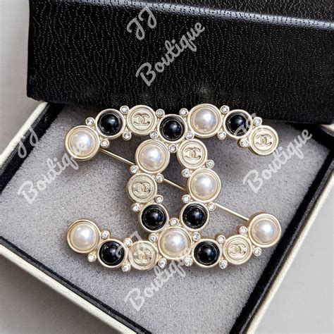 chanel black and white pearl brooch|chanel brooch vintage.